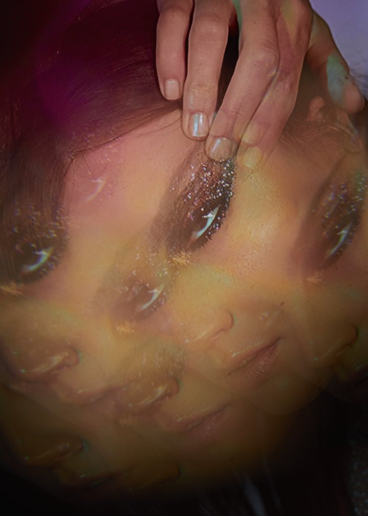 Multiple exposure portrait of a woman with glitter eyeshadow. A hand is placed near her eye. Close-up beauty and fashion shot.