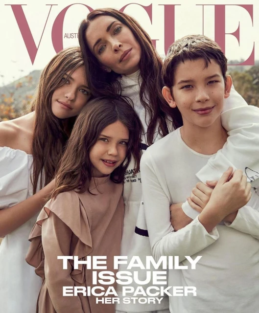Vogue Australia magazine cover featuring Erica Packer and her three children in an outdoor setting with neutral tones and natural light.