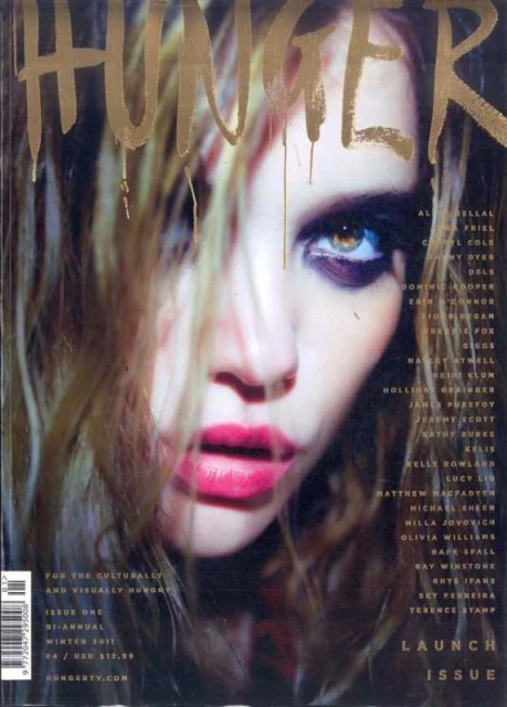 Close-up magazine cover featuring a fair-skinned adult female model with blonde hair and pink lips; 'Hunger' title in gold dripped lettering.