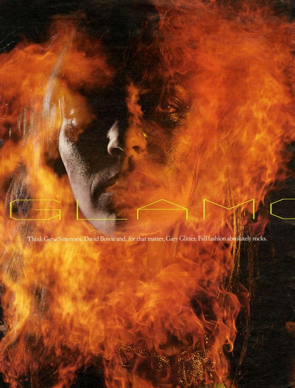 Glamorous portrait of an adult with long hair in front of a fiery background with visible light and shadow play and bold text overlay.