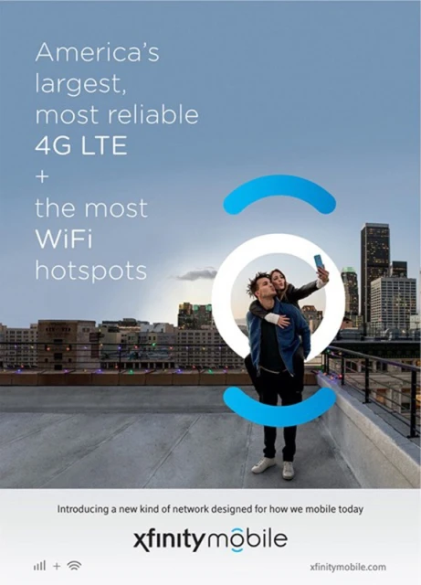 Ad banner featuring a couple taking a selfie on a rooftop with a city skyline, promoting Xfinity Mobile's 4G LTE and WiFi hotspots.