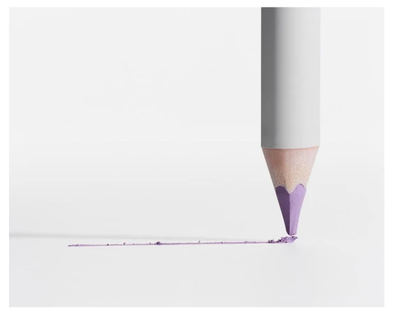 Close-up of a lilac-tipped pencil on white background, drawing a line and leaving a trail of pigment dust. Minimalist beauty or art concept.