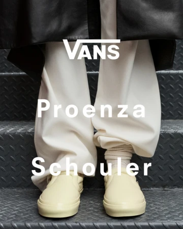 Cream Vans shoes on a metal staircase with white Proenza Schouler text overlay and black jacket detail in this fashion forward still life.