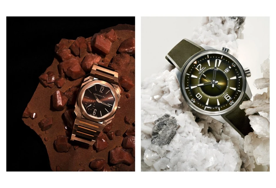 Two luxury watches presented on textured mineral stone displays. The left features a Bulgari Octo Roma, and the right, a Jaeger-LeCoultre.