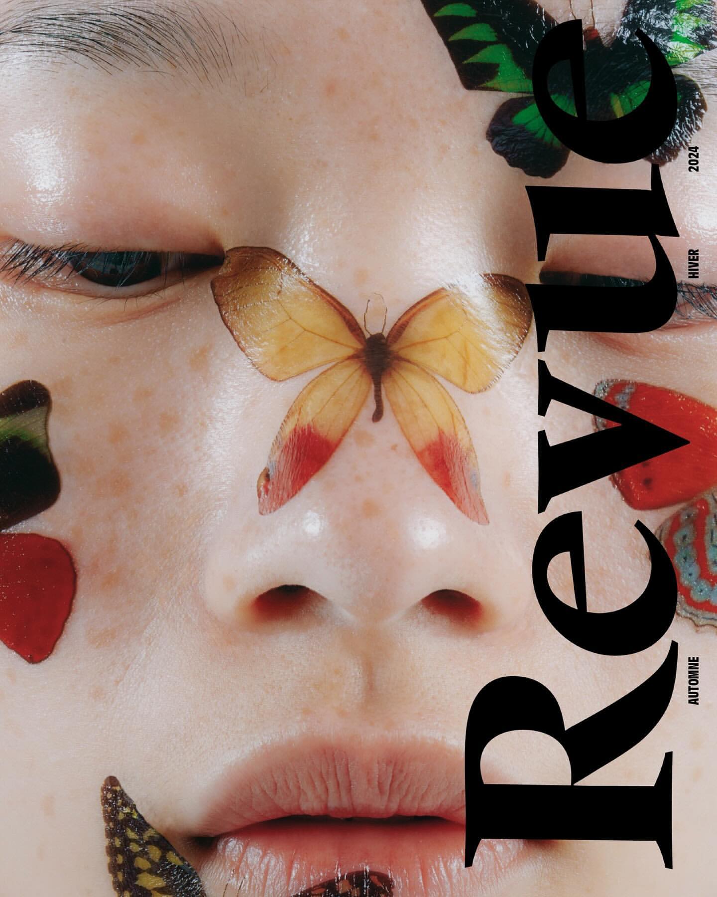 Close-up fashion shot of a fair-skinned person with butterfly decals on their face, next to the masthead for Revue magazine.