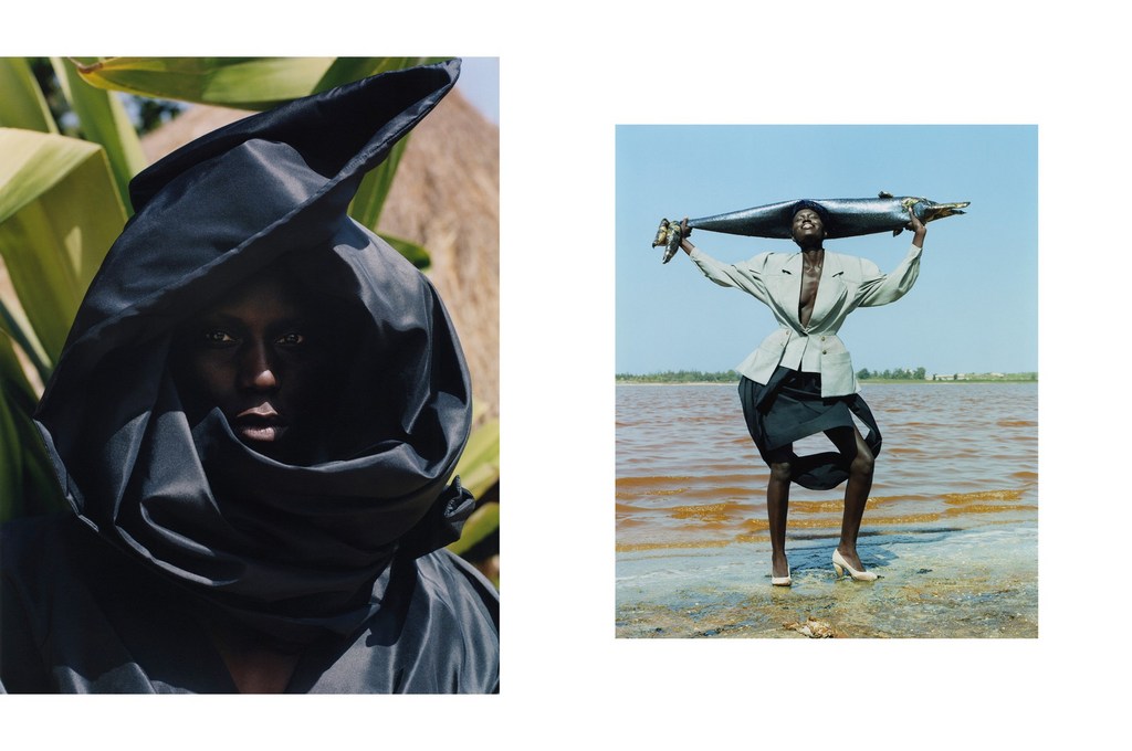 Fashion shot featuring an adult female wearing a black hood, contrasted with another adult female holding a fish, shot in an outdoor setting.