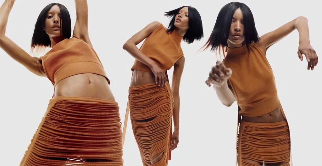 Three poses of an adult female fashion model wearing a textured orange crop top and skirt against a bright white neutral background.
