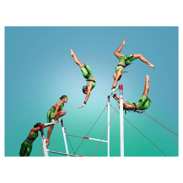 A gymnast performs a series of poses on parallel bars against a gradient teal background in a dynamic action sequence.