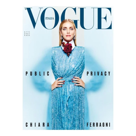 Vogue Italia cover featuring Chiara Ferragni in a blue dress with a red floral embellishment, captured in a studio shot with bold typography.