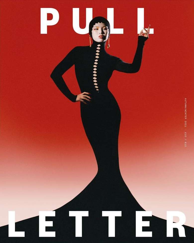 Fashion magazine cover featuring an Asian model in a black gown posing against a red and white gradient background.