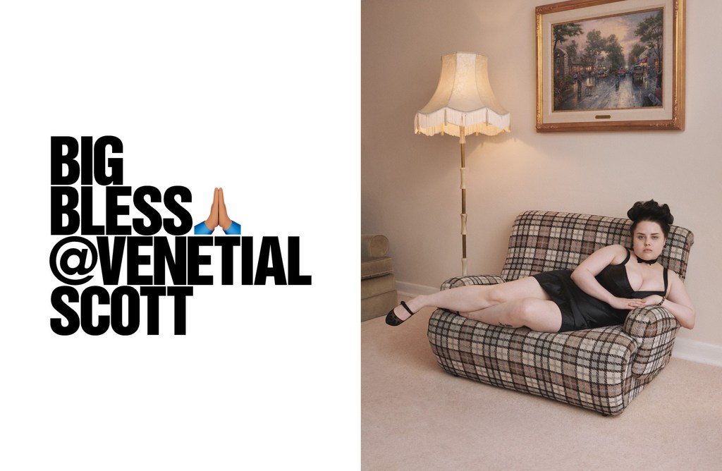 Adult woman in a black dress reclines in a plaid armchair indoors; floor lamp and landscape painting visible in the background.