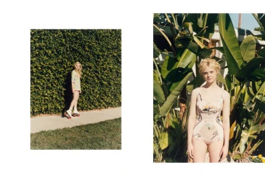 Elle Fanning posing outdoors in a patterned swimsuit among tropical leaves, styled by Venetia Scott.