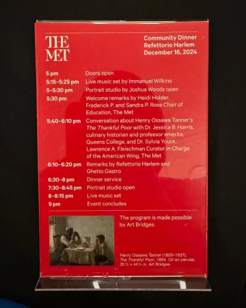 Red sign for Community Dinner Refettorio Harlem event, December 16, 2024, at The Met, featuring schedule and Henry Ossawa Tanner painting.