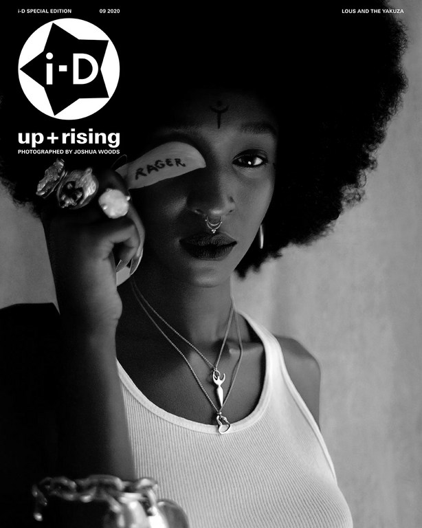 Black and white magazine cover portrait of woman with afro, jewelry, holding paper over eye with text 'RAGER'. i-D logo visible.