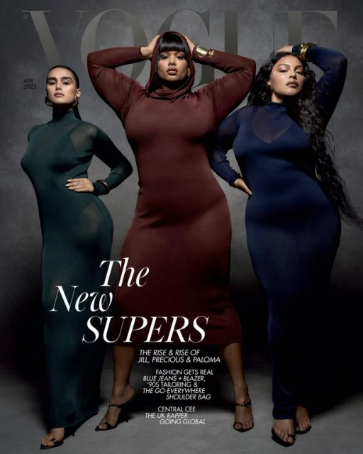 Vogue cover featuring three plus-size models in long-sleeved dresses posing against a gray backdrop, fashion editorial.