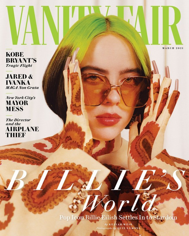 Vanity Fair magazine cover March 2021 featuring Billie Eilish, wearing patterned jacket and glasses, hands framing her face.