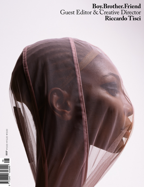 Magazine cover featuring a woman with a sheer veil over her head, with text "Boy.Brother.Friend Guest Editor & Creative Director Riccardo Tisci".