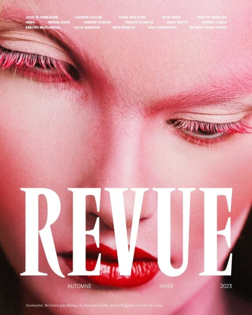 Macro beauty shot of a woman's face on a magazine cover, featuring pale skin, pink eyebrows and eyelashes, and glossy red lips.