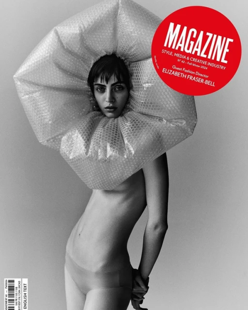 Black and white fashion editorial featuring a woman wearing bubble wrap and a magazine cover with Elizabeth Fraser-Bell.