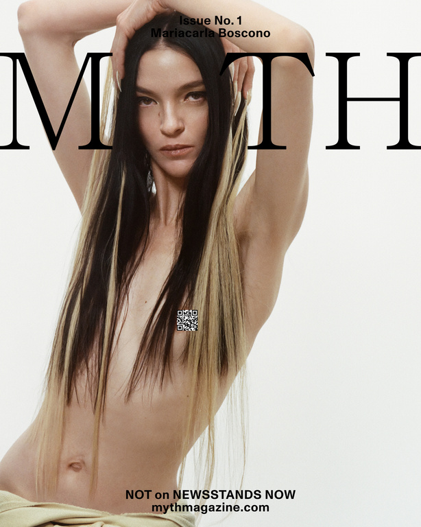 Magazine cover featuring a slender woman with striking black and blonde hair, showcasing Myth Magazine's Issue No. 1 with model name.