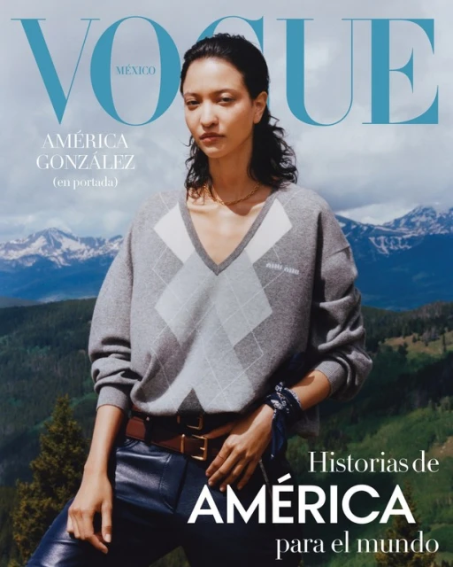 Vogue Mexico cover featuring América González in a gray argyle sweater, leather pants, and a brown belt, set against a mountain backdrop.