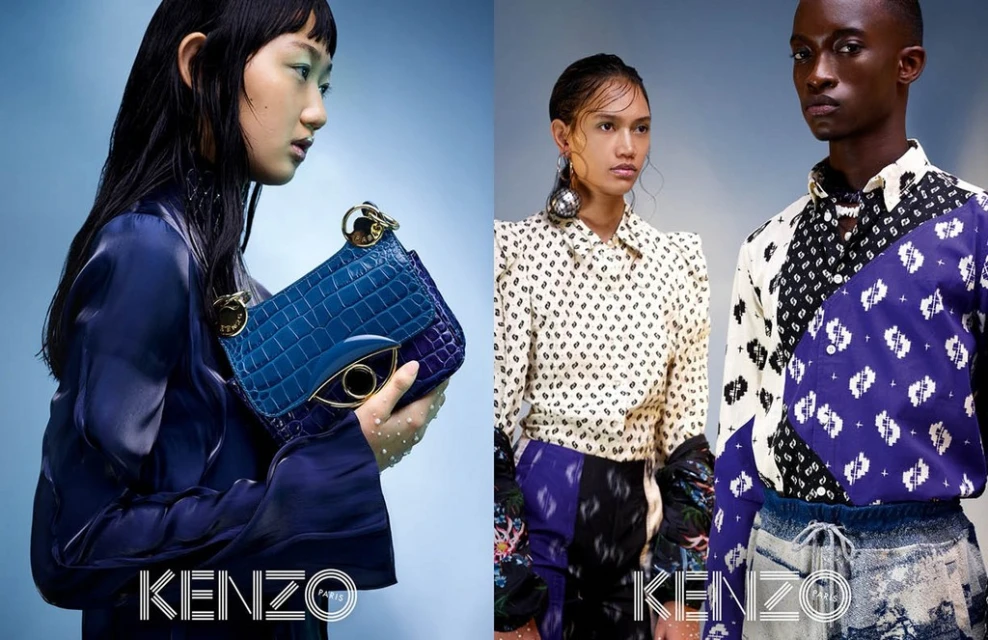 Fashion shoot featuring three models showcasing the Kenzo brand, wearing patterned shirts and holding a textured blue handbag with gold details.