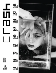 Monochrome portrait of a model viewed through a clear water tank with hands positioned near face.