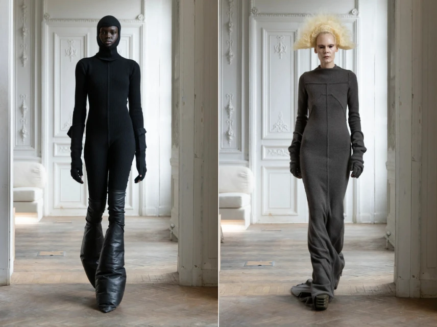 Two models present avant-garde fashion in a studio. One in black bodysuit and cone-shaped boots, the other in a grey dress.