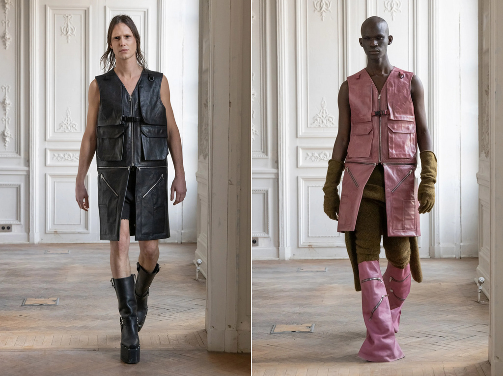 Two fashion models pose indoors wearing avant-garde leather vests and platform boots in a minimalist editorial fashion shoot.