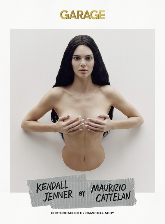 Topless Kendall Jenner in a studio portrait, covering her breasts with hands against a plain white background, with GARAGE logo at top.