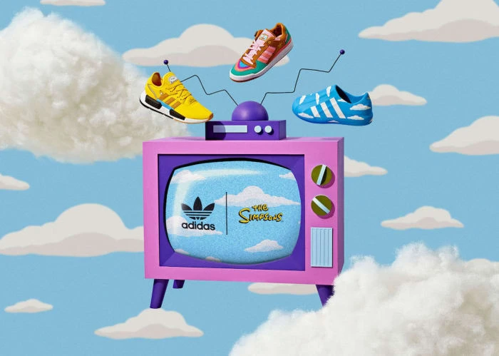 Three Adidas sneakers float above a pink television featuring Adidas and The Simpsons logos against a cloudy blue sky backdrop.