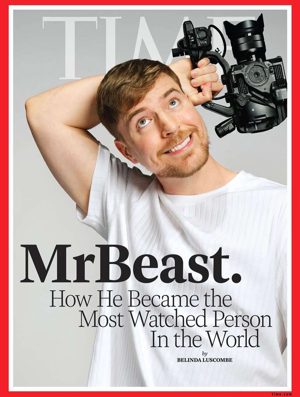 Magazine cover featuring a smiling man holding a professional video camera, the cover reads: 'MrBeast. How He Became the Most Watched Person'.