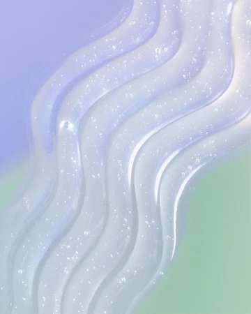 Transparent gel swirls against a two-toned background of purple and green, creating an abstract beauty or healthcare product image.