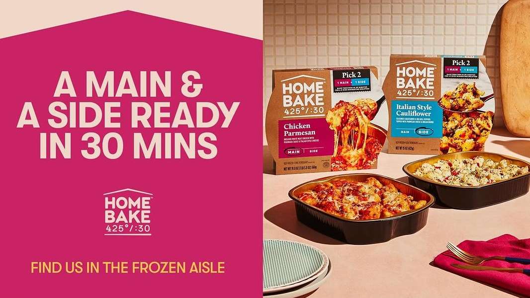 Home Bake frozen meals in packaging and cooked in dishes on a table, featuring chicken parmesan and Italian style cauliflower.