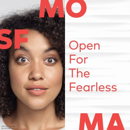 Portrait of a woman with curly hair partially framed by bold red text 'SF' and 'MO,' set against a bright, minimalist background.