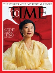 Portrait of Cathy Park Hong wearing a yellow pleated blouse against a red abstract background on a Time magazine cover.