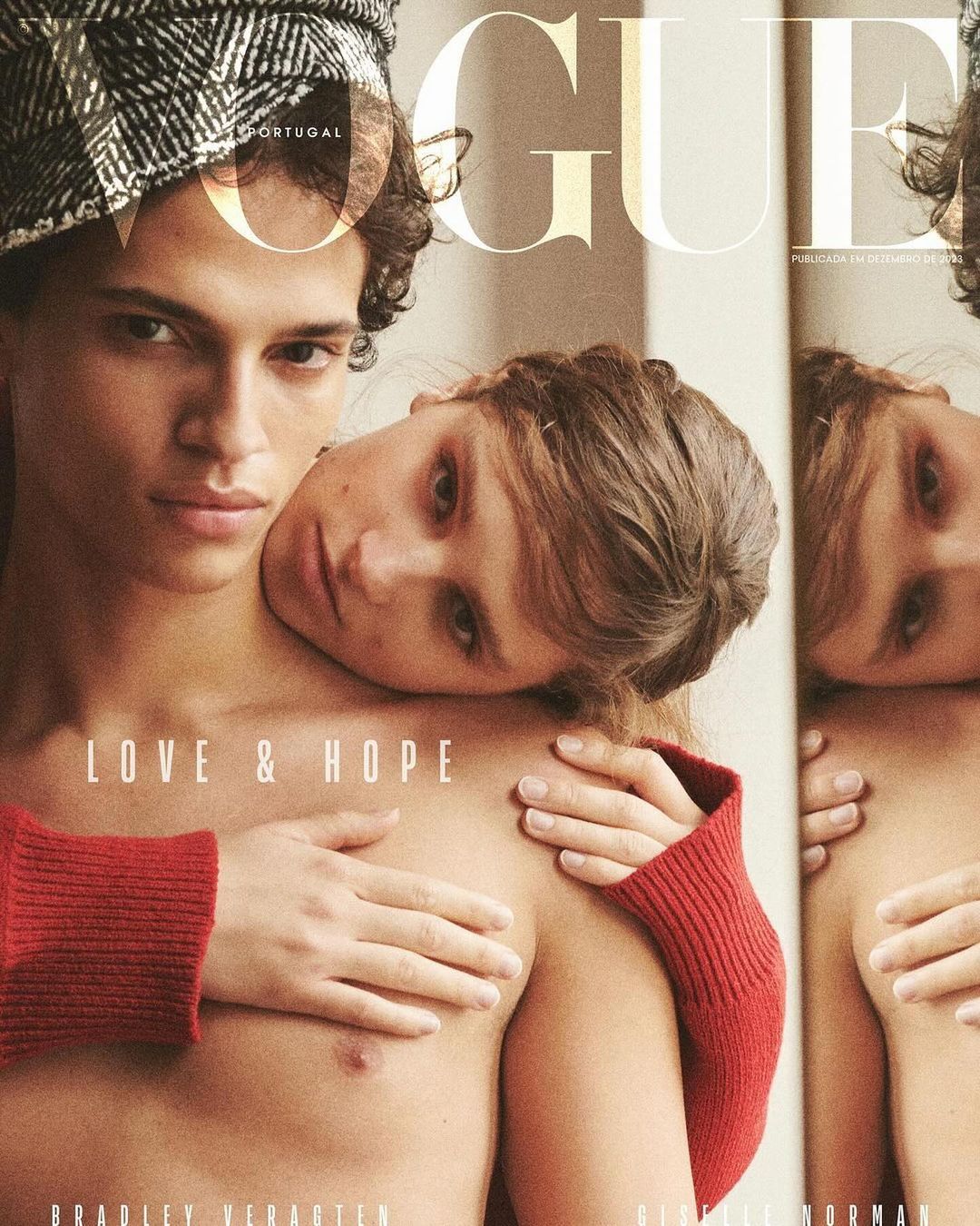 Vogue Portugal magazine cover featuring two light-skinned models, one wearing a black and white checkered hat and a red knit sleeve.