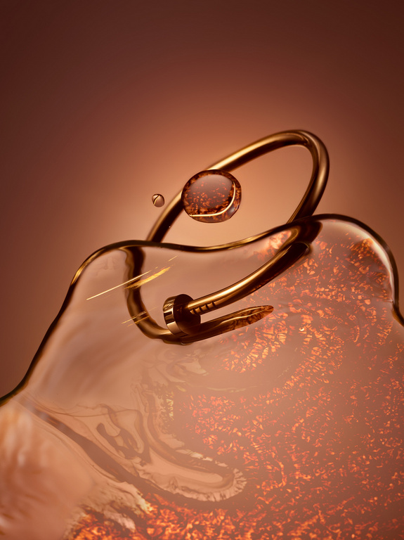 Close-up still life of a gold nail bracelet on a surface of liquid, with water droplets, against a gradient brown background.