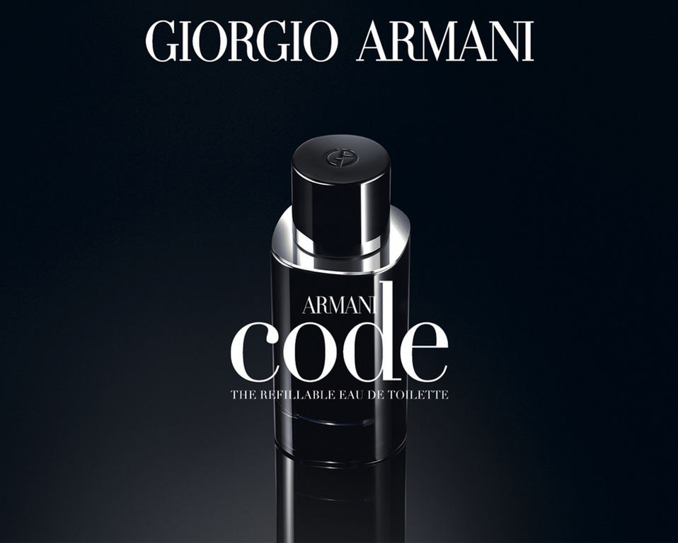 Giorgio Armani 'Armani Code' refillable eau de toilette bottle in a studio shot, emphasizing its sleek design and luxurious appeal on dark surface.