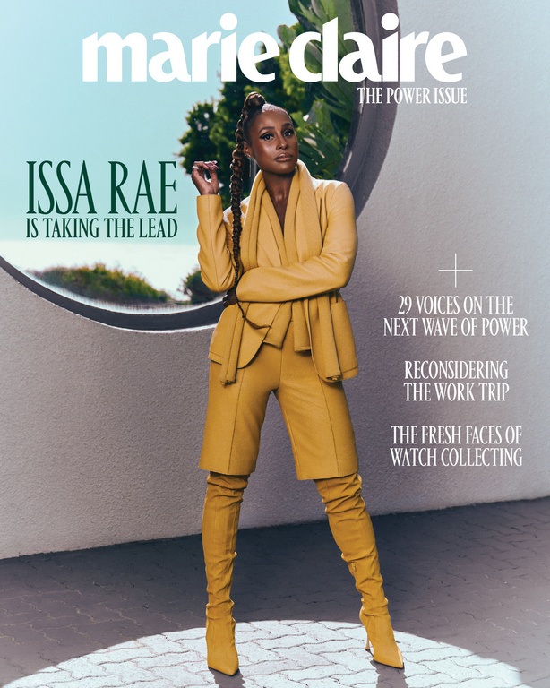 Marie Claire magazine cover featuring Issa Rae in a yellow suit and matching thigh-high boots, posing in front of architectural detail.