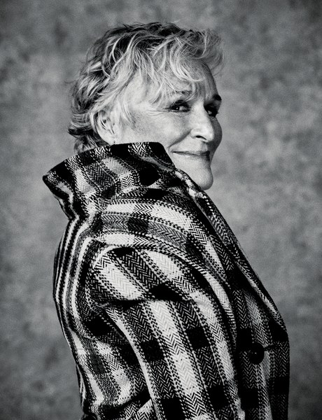 Portrait of Glenn Close in profile wearing a patterned houndstooth coat, photographed by Damon Baker in monochrome.