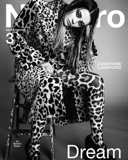 Josephine Langford poses in a leopard-print coat and leggings on a stool, in a black-and-white fashion magazine cover photo.