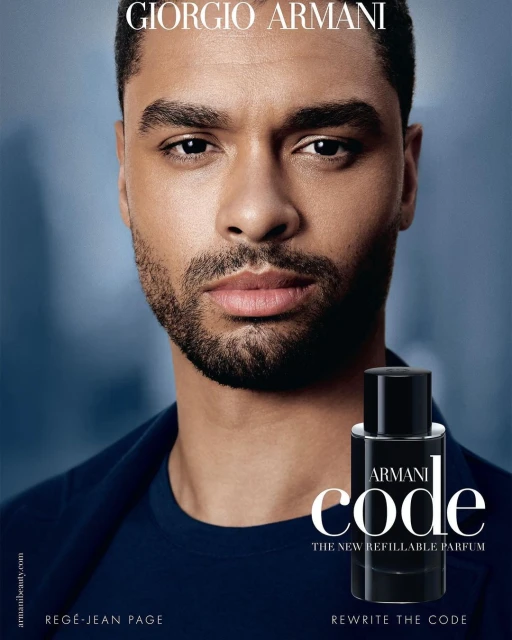 Regé-Jean Page for Giorgio Armani Code perfume campaign. Close-up studio shot of the handsome actor and the cologne bottle.