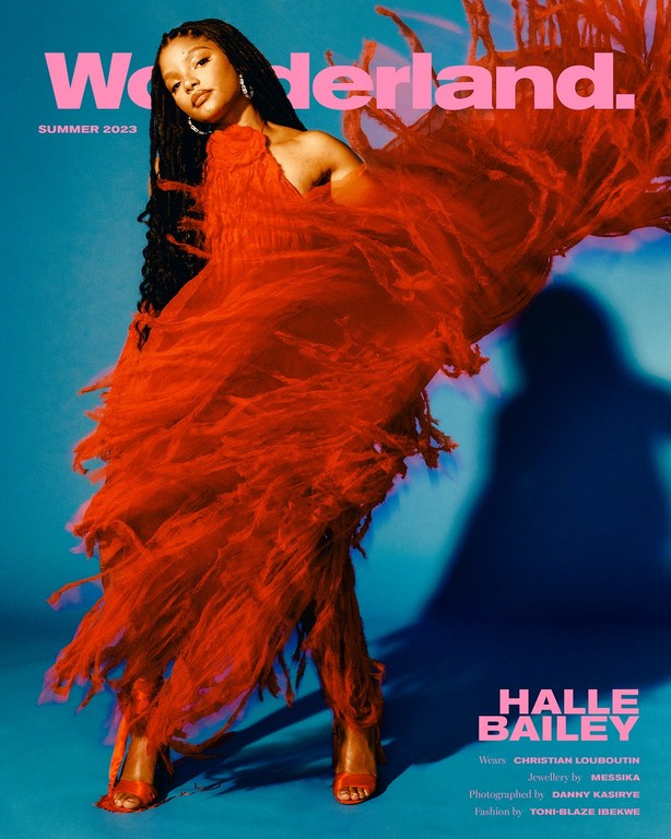 Wonderland magazine cover featuring Halle Bailey wearing a red, textured dress against a teal backdrop with dramatic shadow.