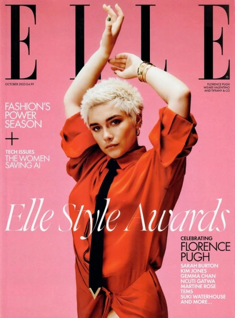 Elle magazine cover featuring Florence Pugh in an orange dress with hands raised, against a pink background with masthead and text.