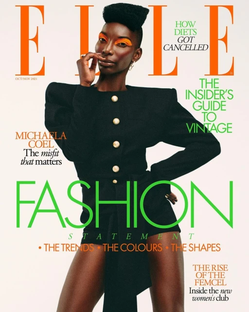 Elle magazine cover featuring Michaela Coel in a black jacket with bright orange eye makeup, promoting fashion trends and vintage style.