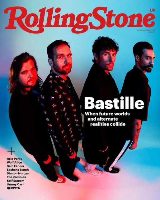 Rolling Stone UK cover featuring four adult males standing indoors with colorful lighting and the Rolling Stone logo displayed on top.