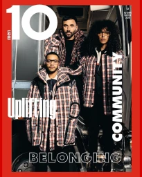 Three models wearing matching plaid jackets posing together inside a truck cabin with a bold red border frame and white editorial text overlay.