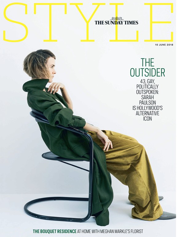 Sarah Paulson on Style Magazine cover: side-profile, seated pose in green jacket, gold pants, and black chair against a white backdrop.