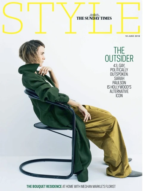 Sarah Paulson on Style Magazine cover: side-profile, seated pose in green jacket, gold pants, and black chair against a white backdrop.